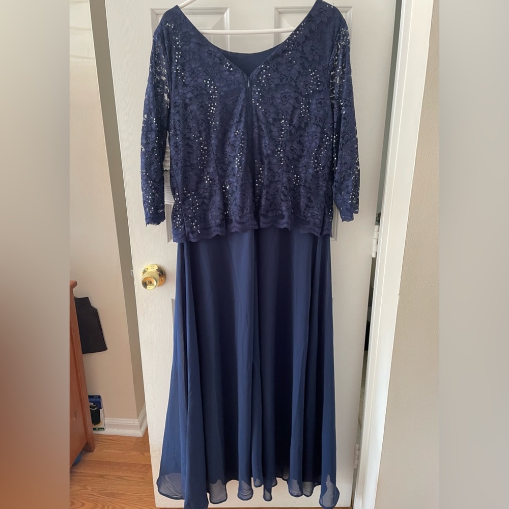 Navy Blue floor length dress that has never been worn.